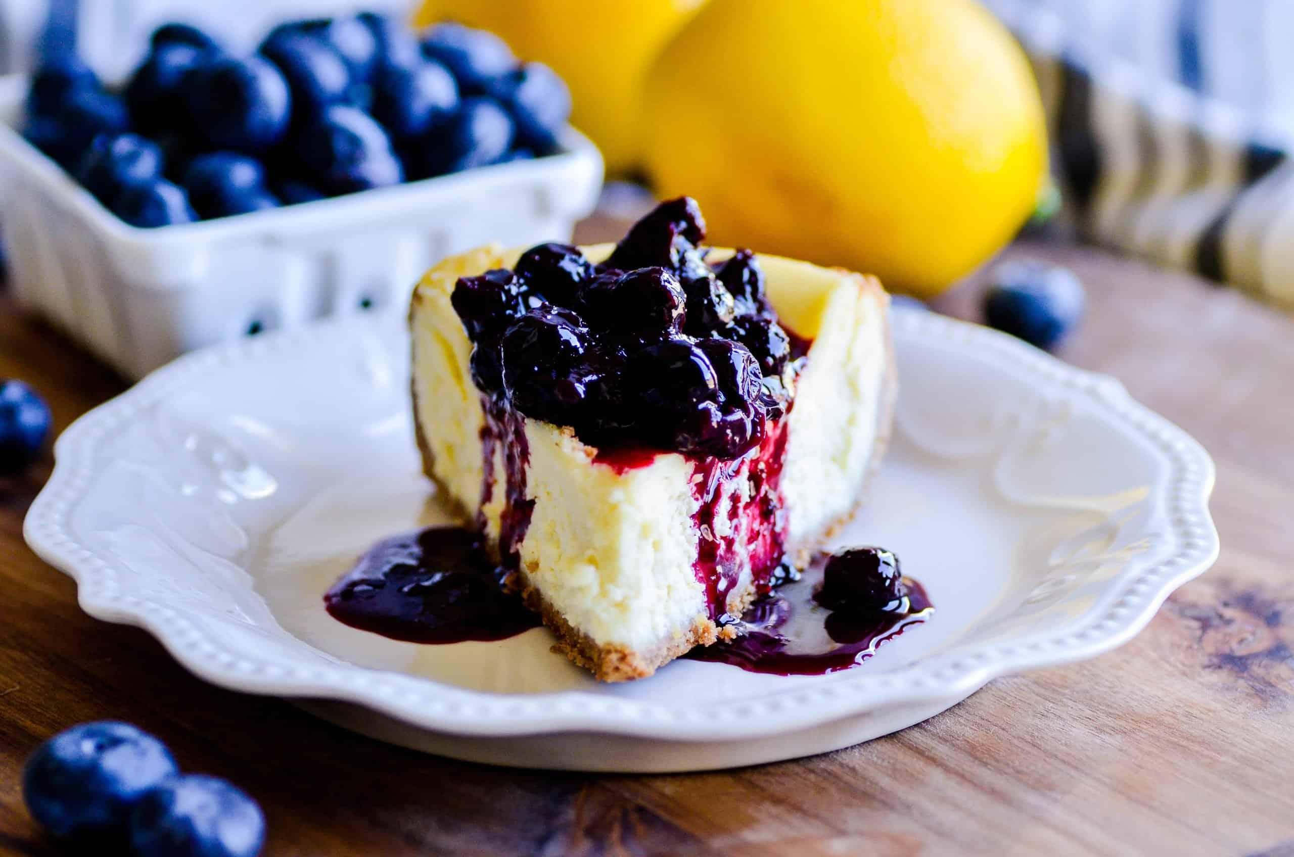 Lemon Cheesecake with Blueberry Sauce Recipe - Something Swanky